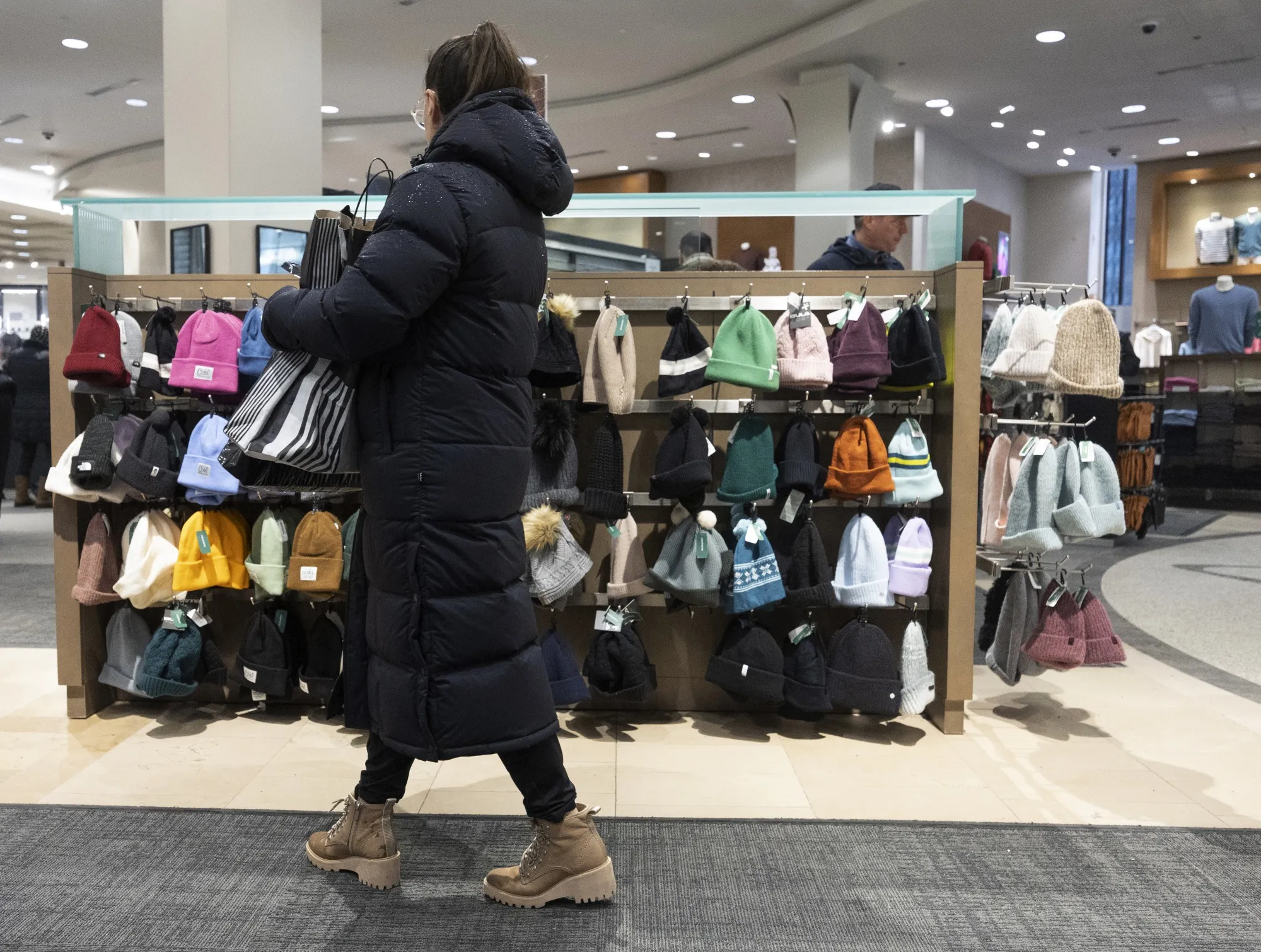 A shopper in a clothing store in Montreal.