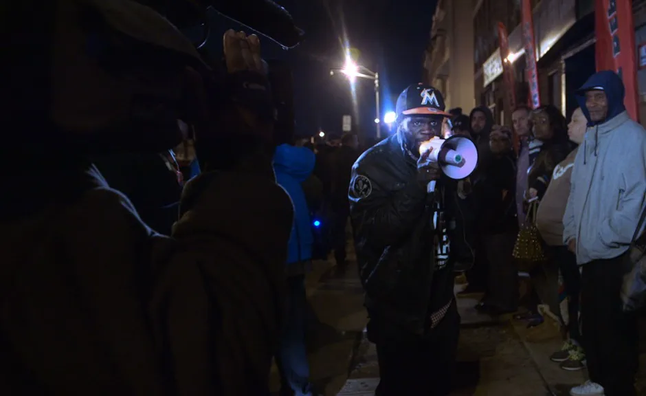 Activist Genard “Shadow” Barr speaks out against police violence in the HBO documentary "Baltimore Rising"