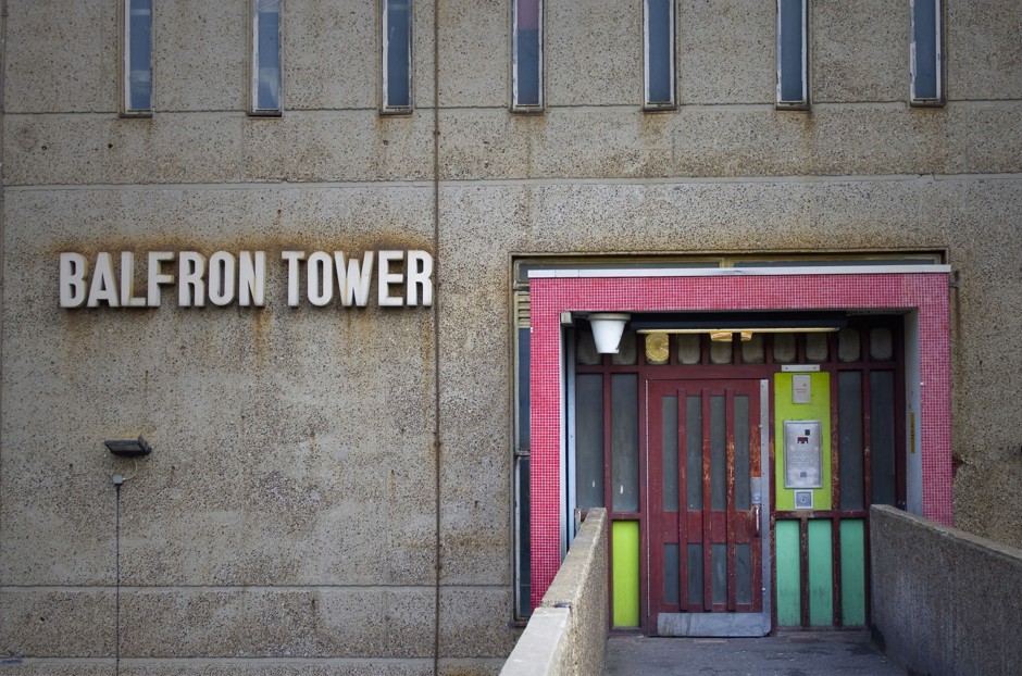 The entrance to East London's iconic Balfron Tower, a long-decaying brutalist behemoth that has traditionally housed lower-income residents. 