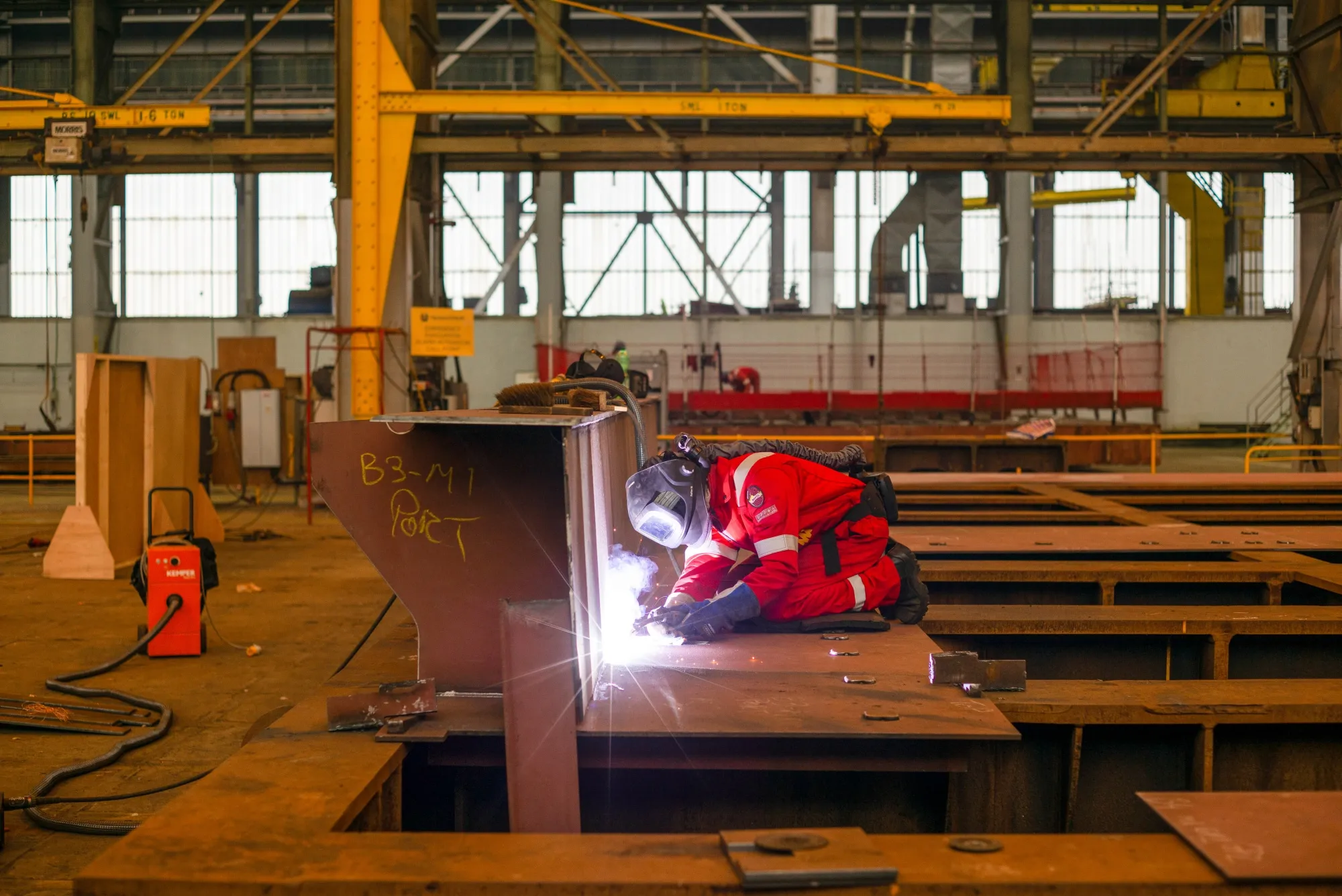 A welder works on a barge under construction at a&nbsp;shipyard in Belfast, Northern Ireland, UK.