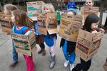 Girl Scouts from Eugene, Ore. fan out to sell cookies on the University of Oregon campus in 2013
