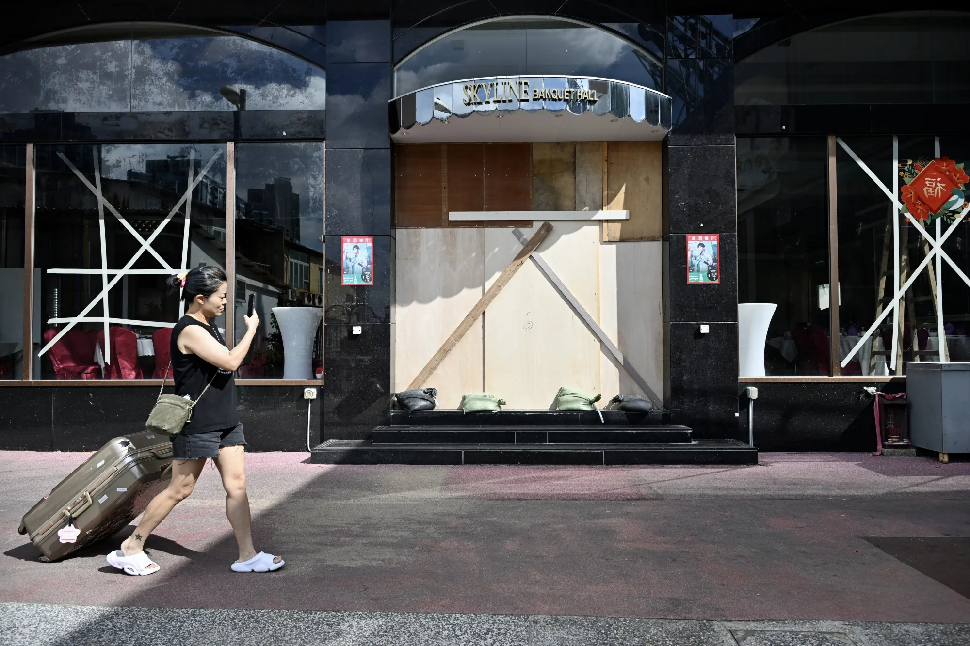 Sandbags stacked at the entrance of a store ahead of Typhoon Yagi in Hong Kong on Sept. 5.