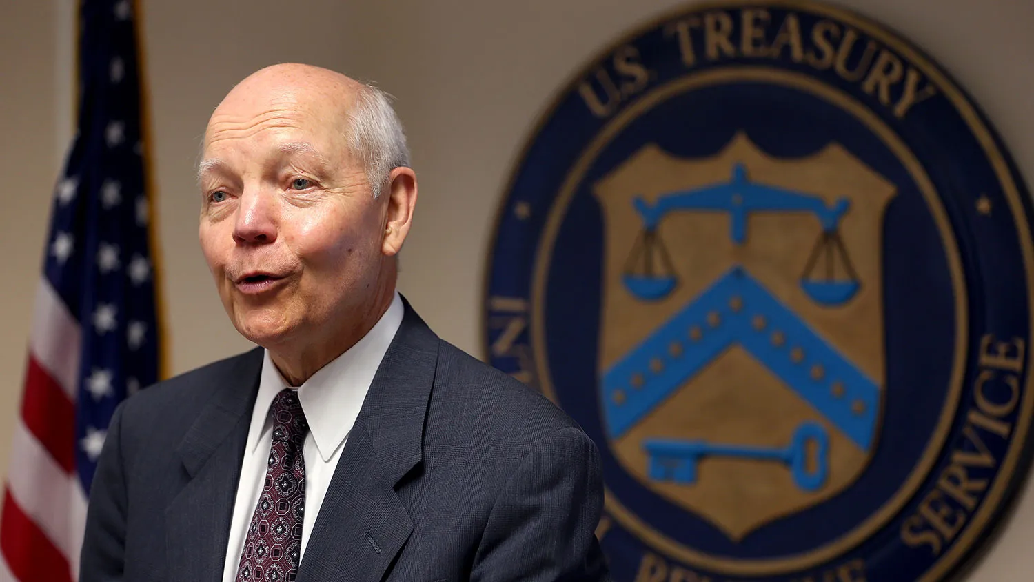 Internal Revenue Service Commissioner John Koskinen speaks to the media during a visit to the Miami office at the Claude Pepper Federal Building on July 31, 2014 in Miami, Florida.
