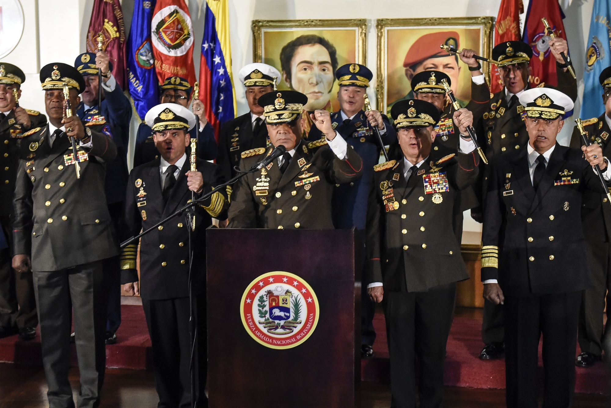 Vladimir Padrino Lopez, Venezuela's defense minister, center, gestures while speaking during a press conference accompanied by the military high command at the Ministry of Defense in Caracas, Venezuela, on Jan. 24.&nbsp;