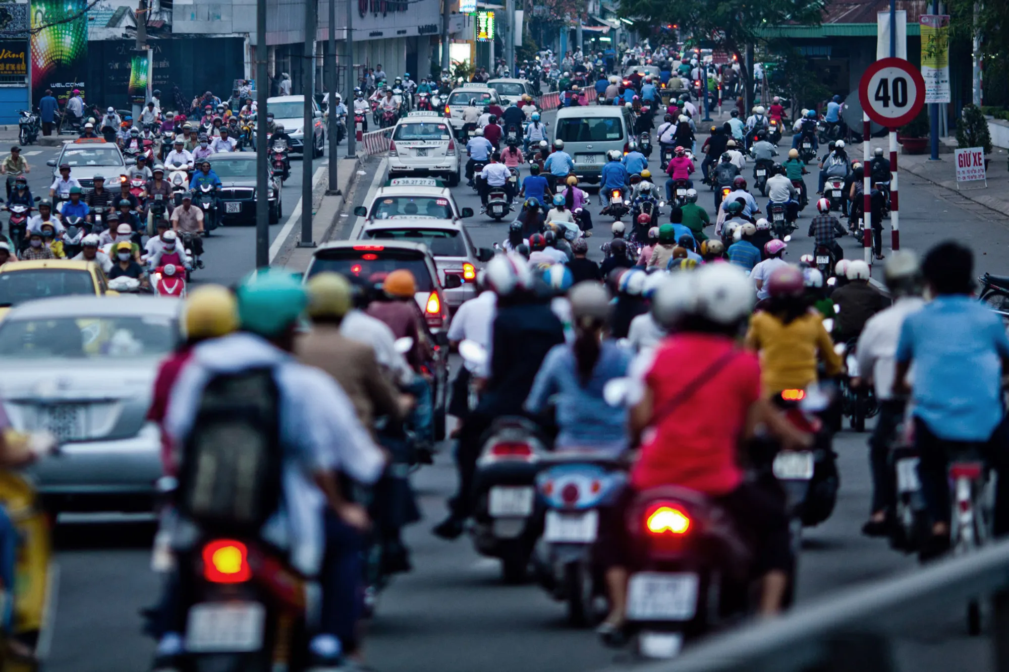Traffic moves along in downtown Ho Chi Minh City, Vietnam.
