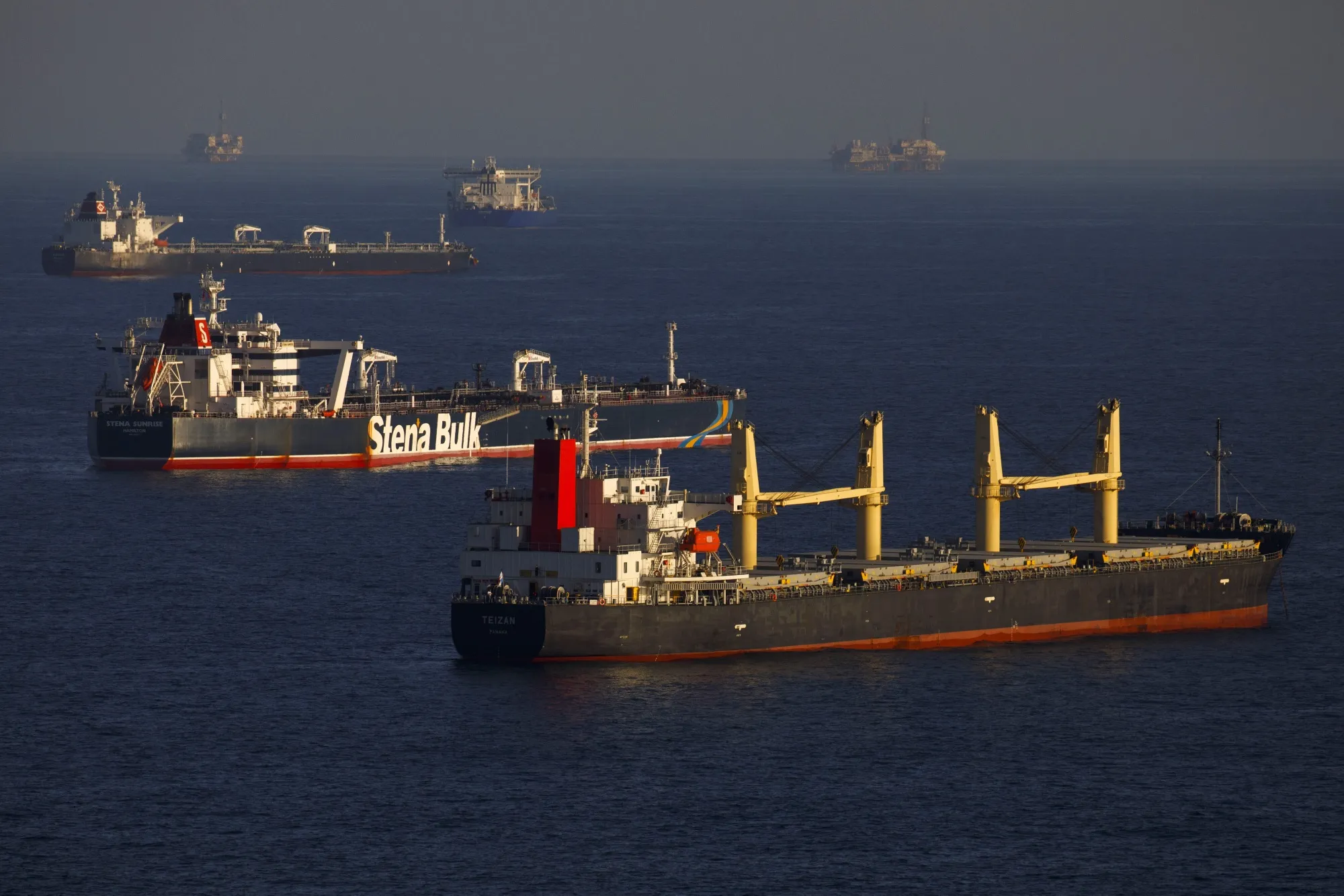 Oil tankers are seen anchored in the Pacific Ocean in this aerial photograph taken above Long Beach, California, U.S., on&nbsp;May 1.