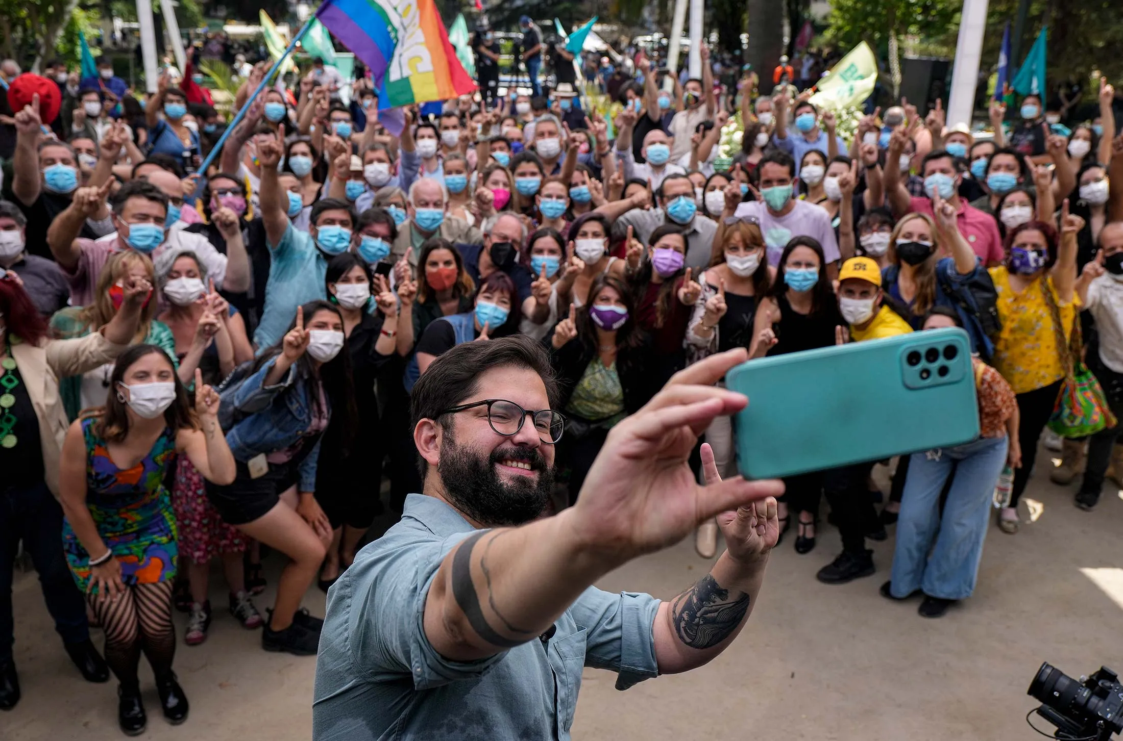 Boric, of the coalition&nbsp;Apruebo Dignidad, takes a selfie with members of his campaign and supporters in Santiago on Nov. 1.&nbsp;