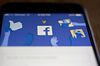 Facebook App And Logo As Crisis Reignites Washington Scrutiny Of Social Networks