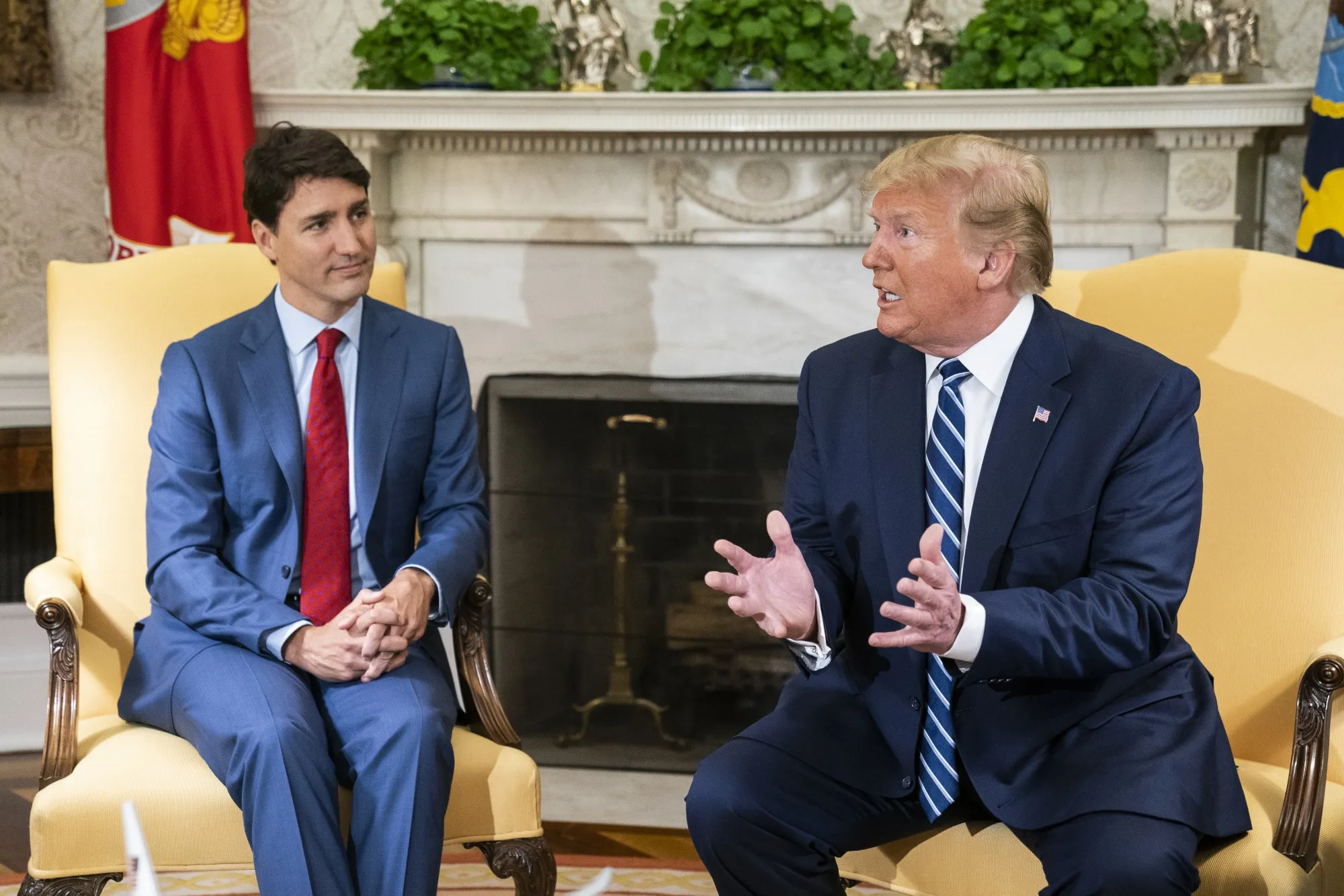 Donald Trump speaks with Justin Trudeau in the Oval Office of the White House in 2019.