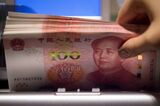 Counting of Chinese Yuan At A Hang Seng Bank Branch