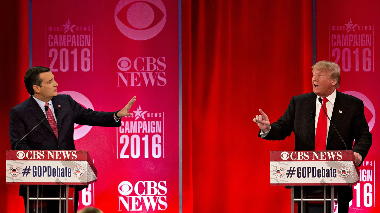 Ted Cruz and Donald Trump speak during a Republican presidential candidate debate in Greenville, South Carolina, on Feb. 13, 2016.
