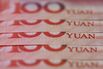 Stocks Boards And Chinese Yuan Banknotes As China Devalues Yuan By Most In Two Decades