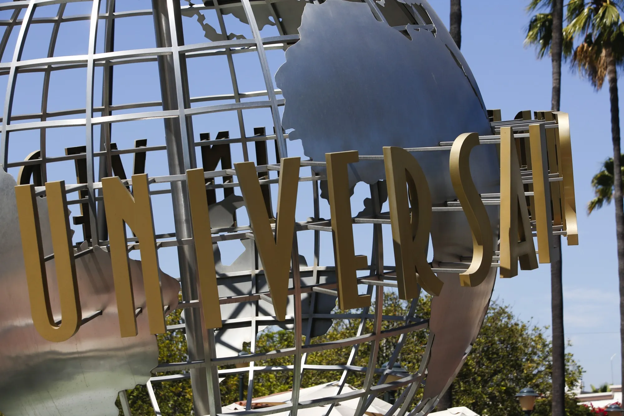 The Universal globe stands at the main entrance to the Universal Studios Hollywood theme park stands in Hollywood.