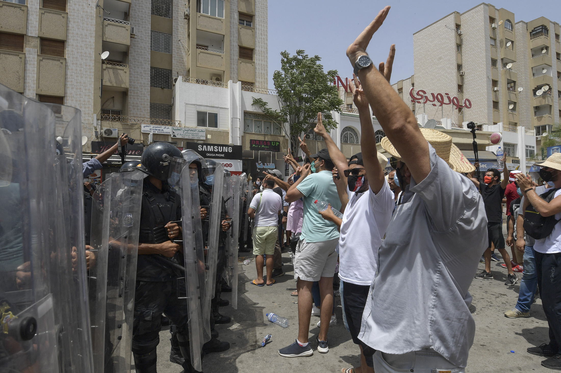 Tunisian President Fires Premier After Violent Protests - Bloomberg