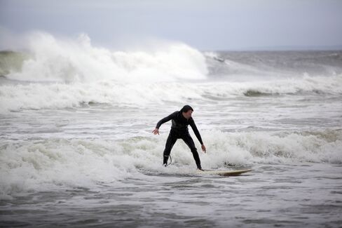 Hurricane Sandy Barrels North, Halts Travel, Forces Evacuations