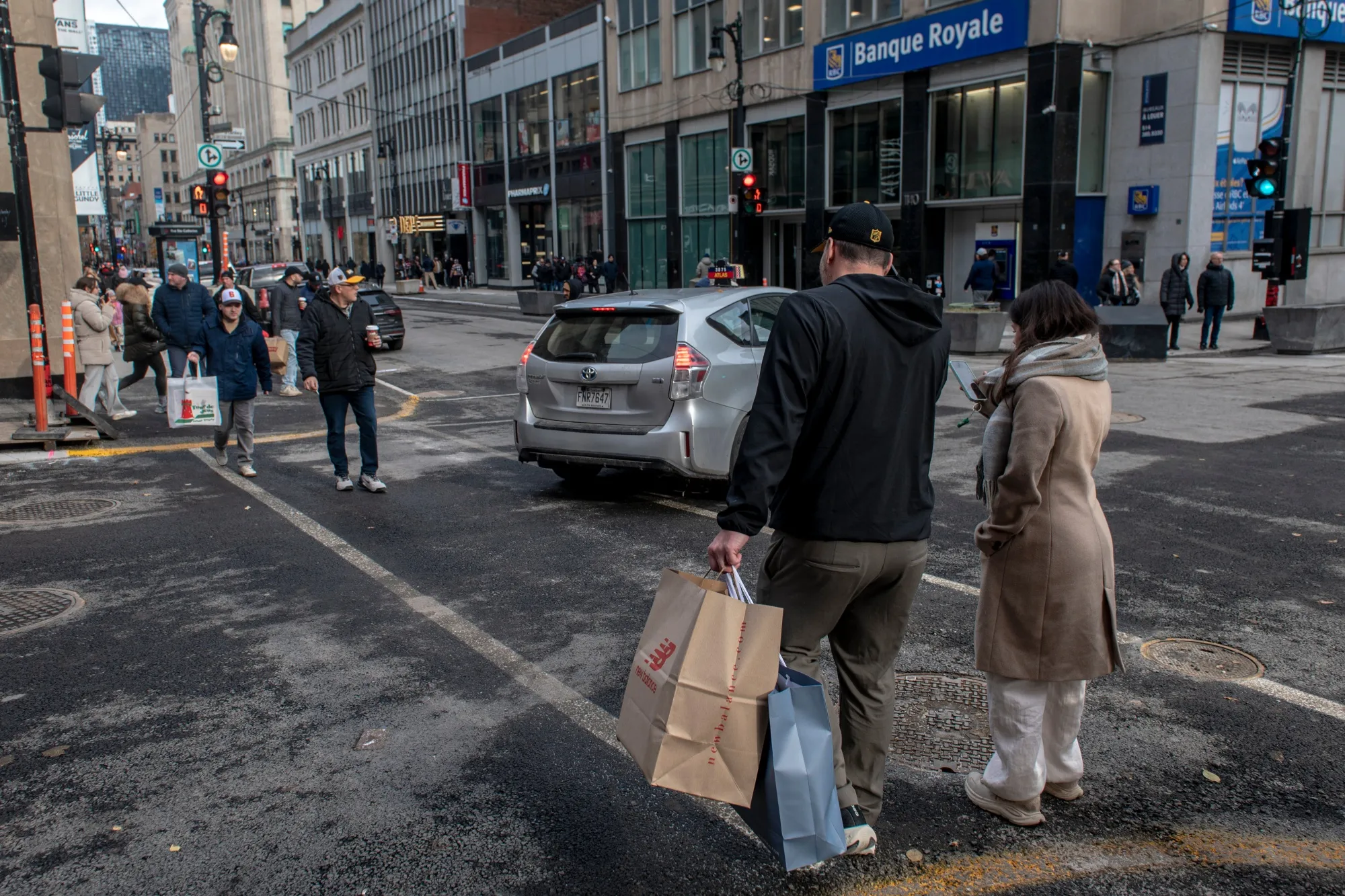 Shoppers on Sainte-Catherine Street in Montreal.