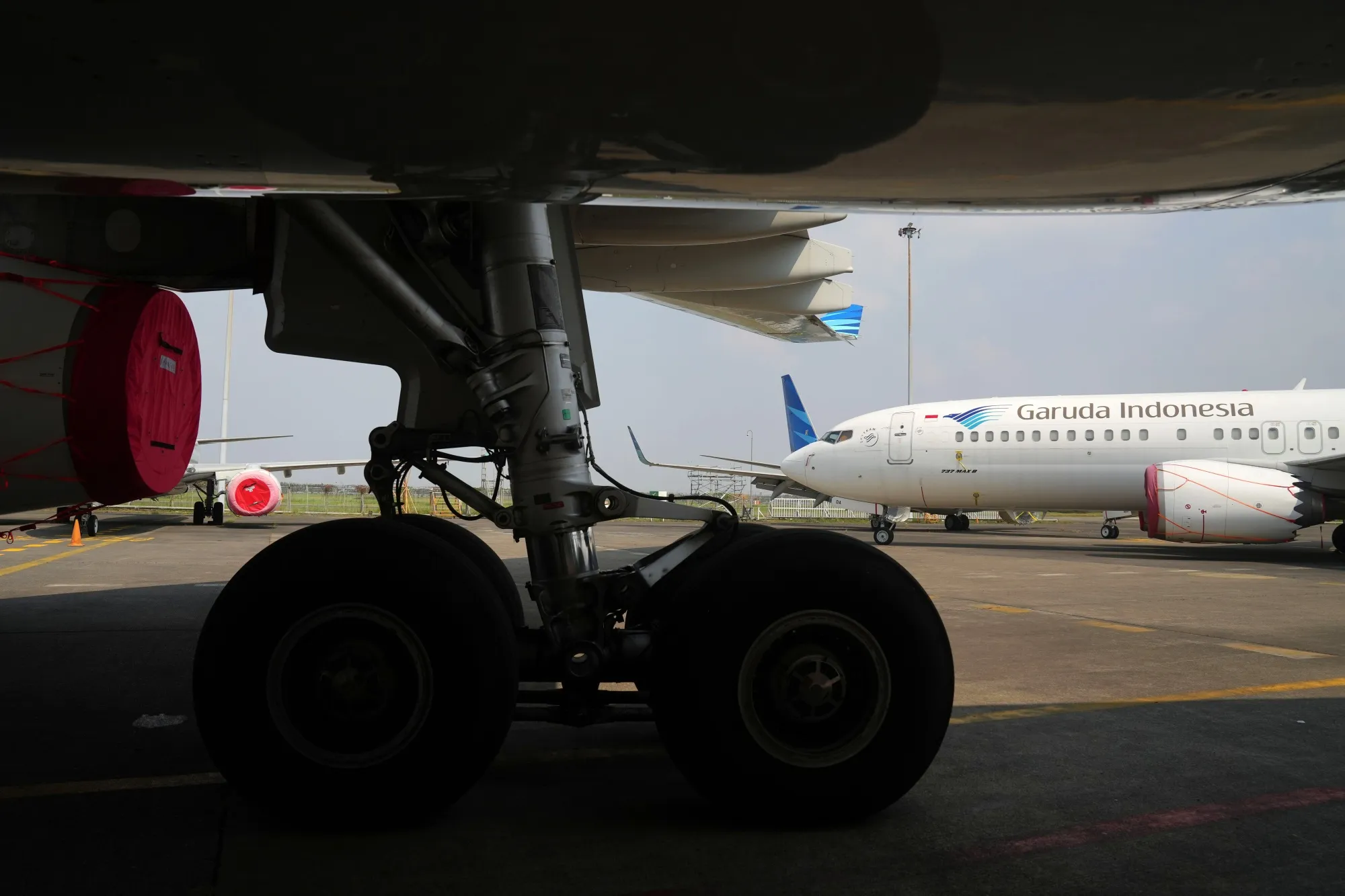 PT Garuda Indonesia aircraft outside a hangar at the company's maintenance facility in 2022.