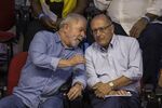 Brazil's presidential front-runner Luiz Inacio Lula da Silva, left, speaks with his running mate Geraldo Alckmin