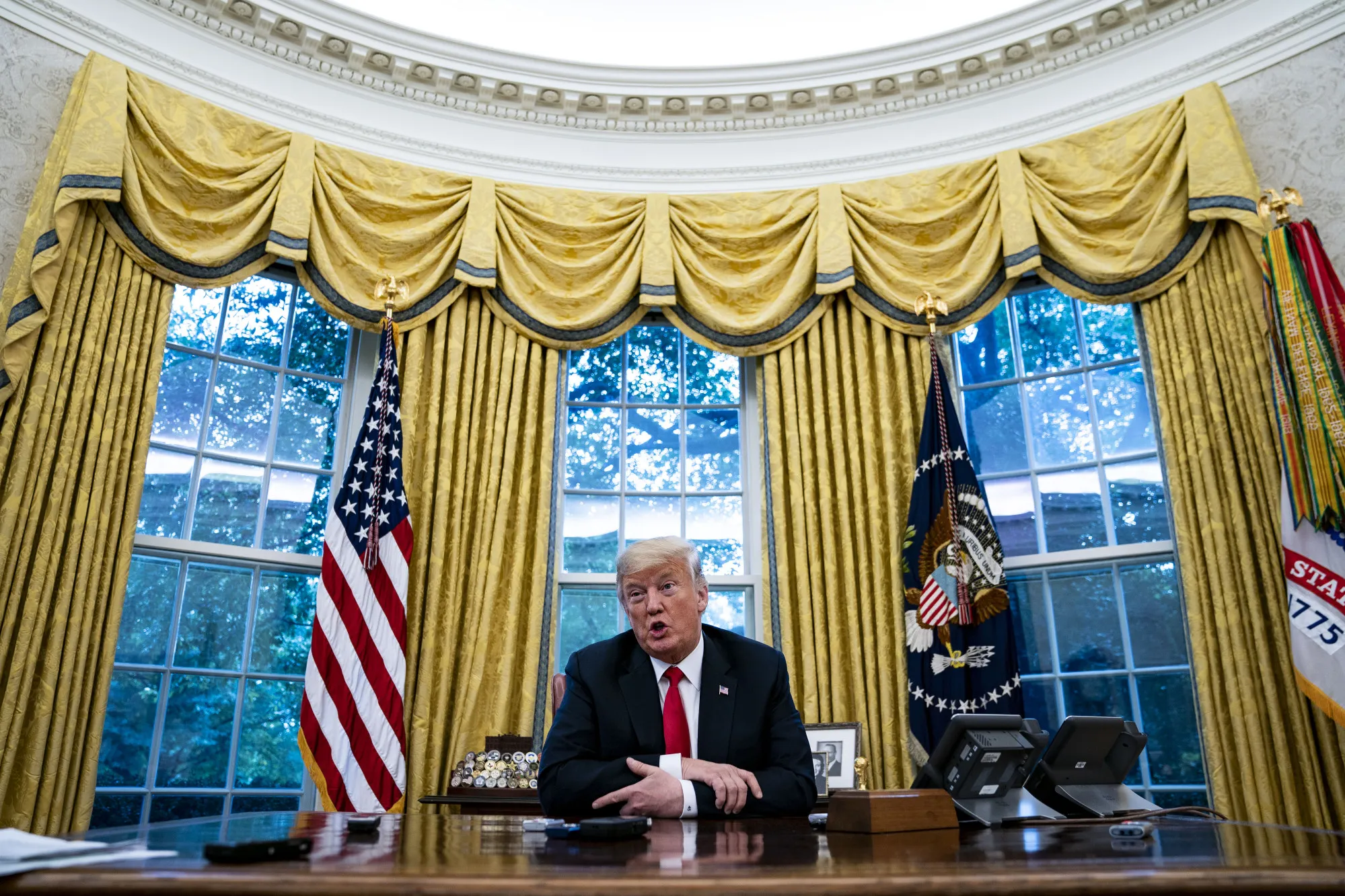 Trump speaks during an interview in the Oval Office on Aug. 30.