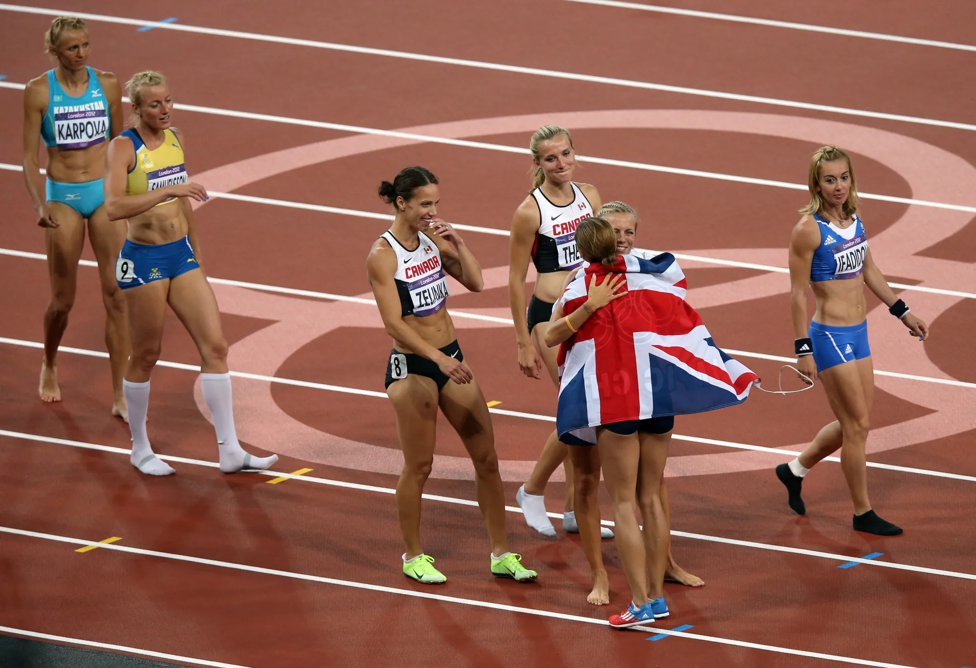 This year, hugs are out. Above: Jessica Ennis is congratulated for her gold in women’s heptathlon in London in 2012.