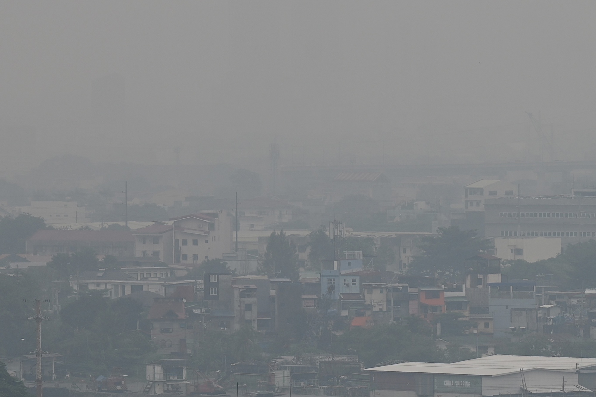 philippines-urges-people-to-mask-up-after-volcanic-smog-alert-bloomberg