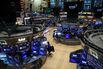 Traders work on the floor of the New York Stock Exchange