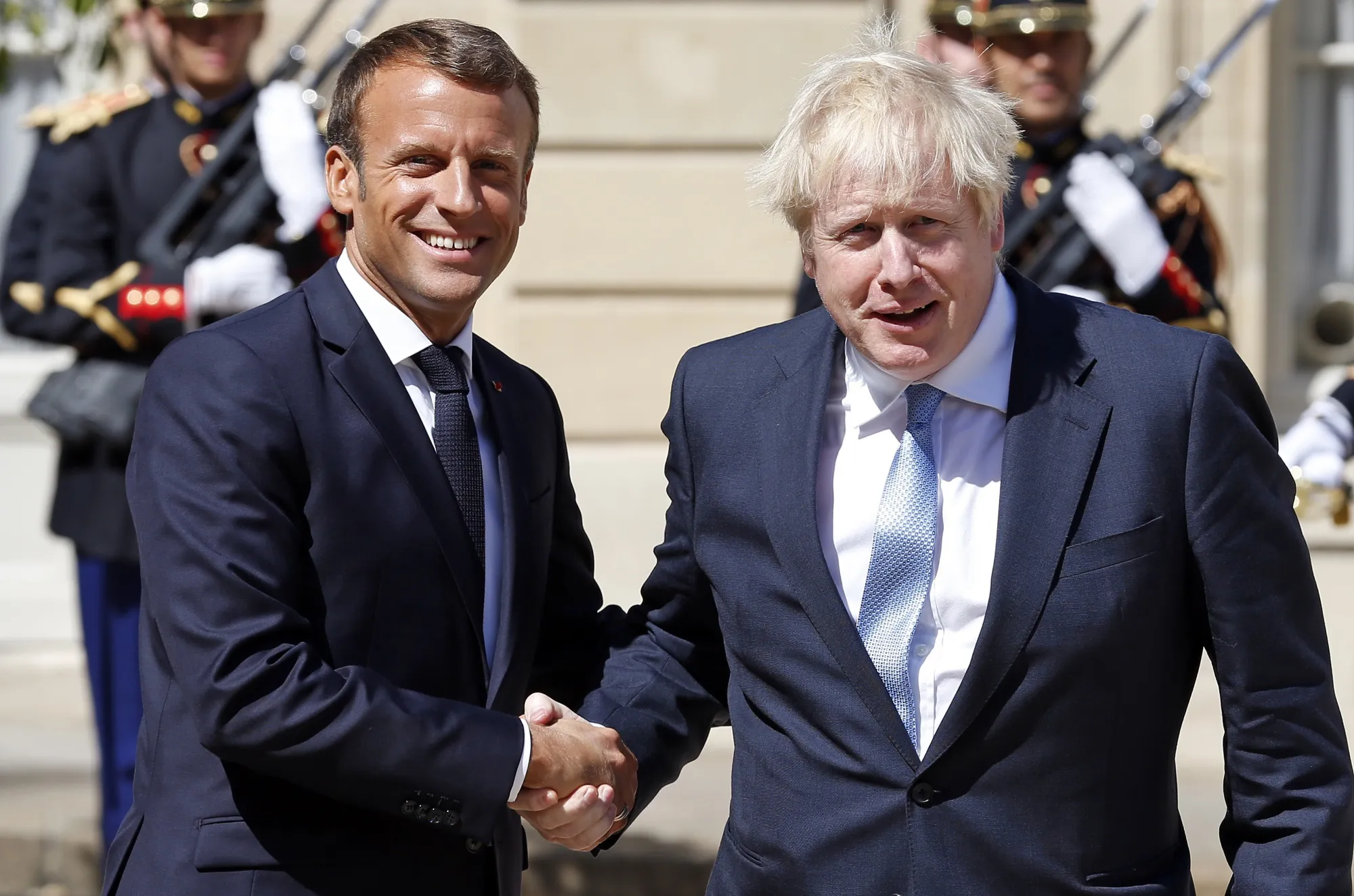 Emmanuel Macron greets&nbsp;Boris Johnson at the Elysee Presidential Palace in 2019.