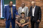 Al Oliver, left, Gene Clines, center, Manny Sanguillen, seated, and Dave Cash pose for a portrait during an event hosted by the Pittsburgh Pirates to celebrate the 50th anniversary of the first all-minority lineup to take the field in Major League Baseball history, at the Heinz History Center, Wednesday, Sept. 1, 2021, in Pittsburgh. Clines, a line drive-hitting outfielder for the 1971 World Series champion Pittsburgh Pirates, died Thursday, Jan. 27, 2022. He was 75. Clines’ wife, Joanne, told the Pirates that Clines died at his home in Bradenton, Florida. (Alexandra Wimley/Pittsburgh Post-Gazette via AP, File)