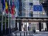 The stars of the European Union (EU) sit on office windows at European Parliament's Paul-Henri Spaak building in Brussels, Belgium, on Wednesday, May 27, 2020.