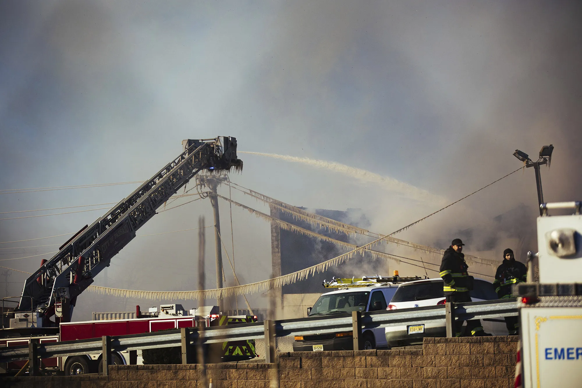 Firefighters battle a blaze in an industrial area in Passaic, Jan 30.&nbsp;