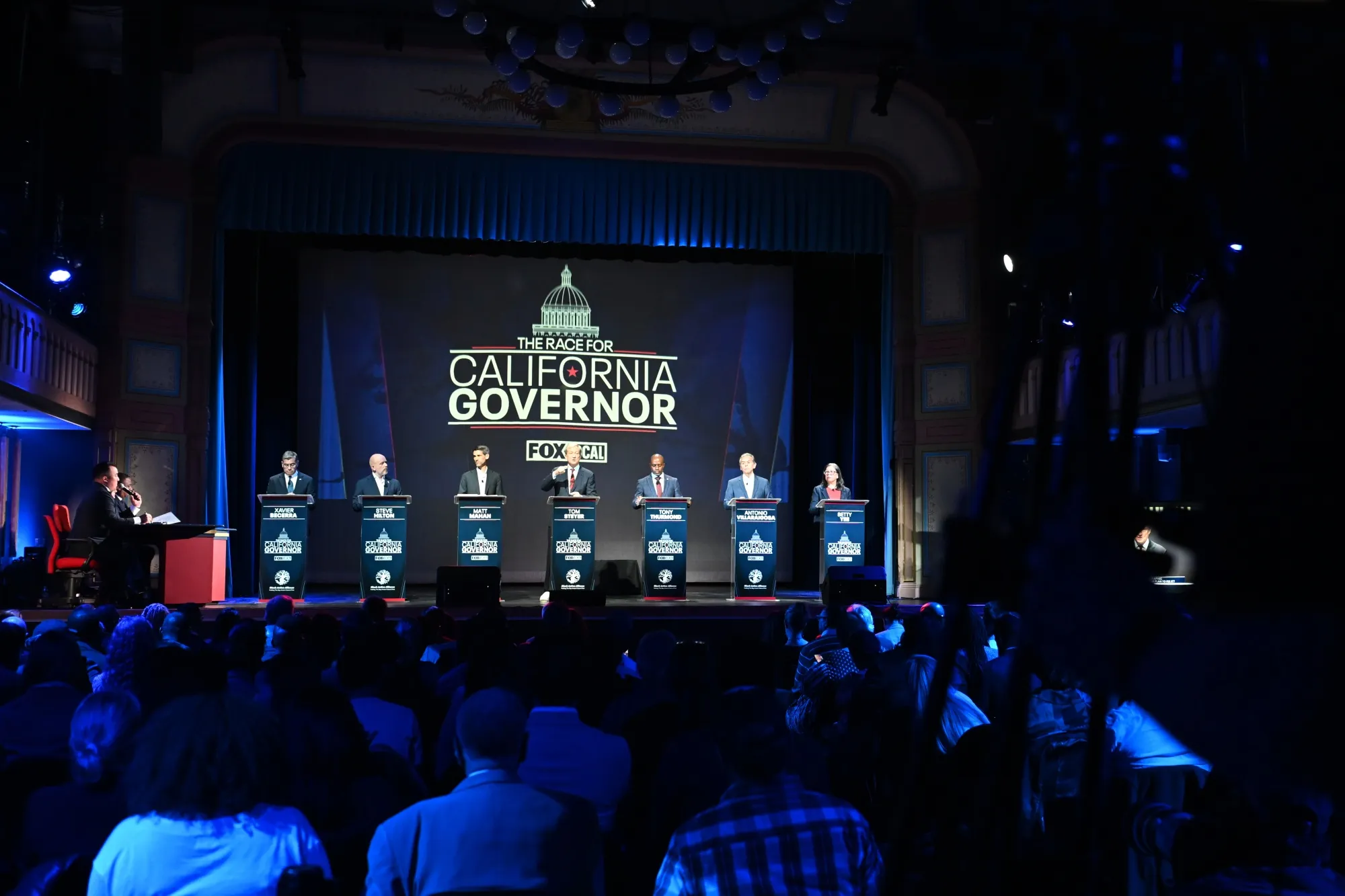 Xavier Becerra, from left, Steve Hilton, Matt Mahan, Tom Steyer, Tony Thurmond, Antonio Villaraigosa and Betty Yee during the California gubernatorial candidate debate in San Francisco on Feb. 3.