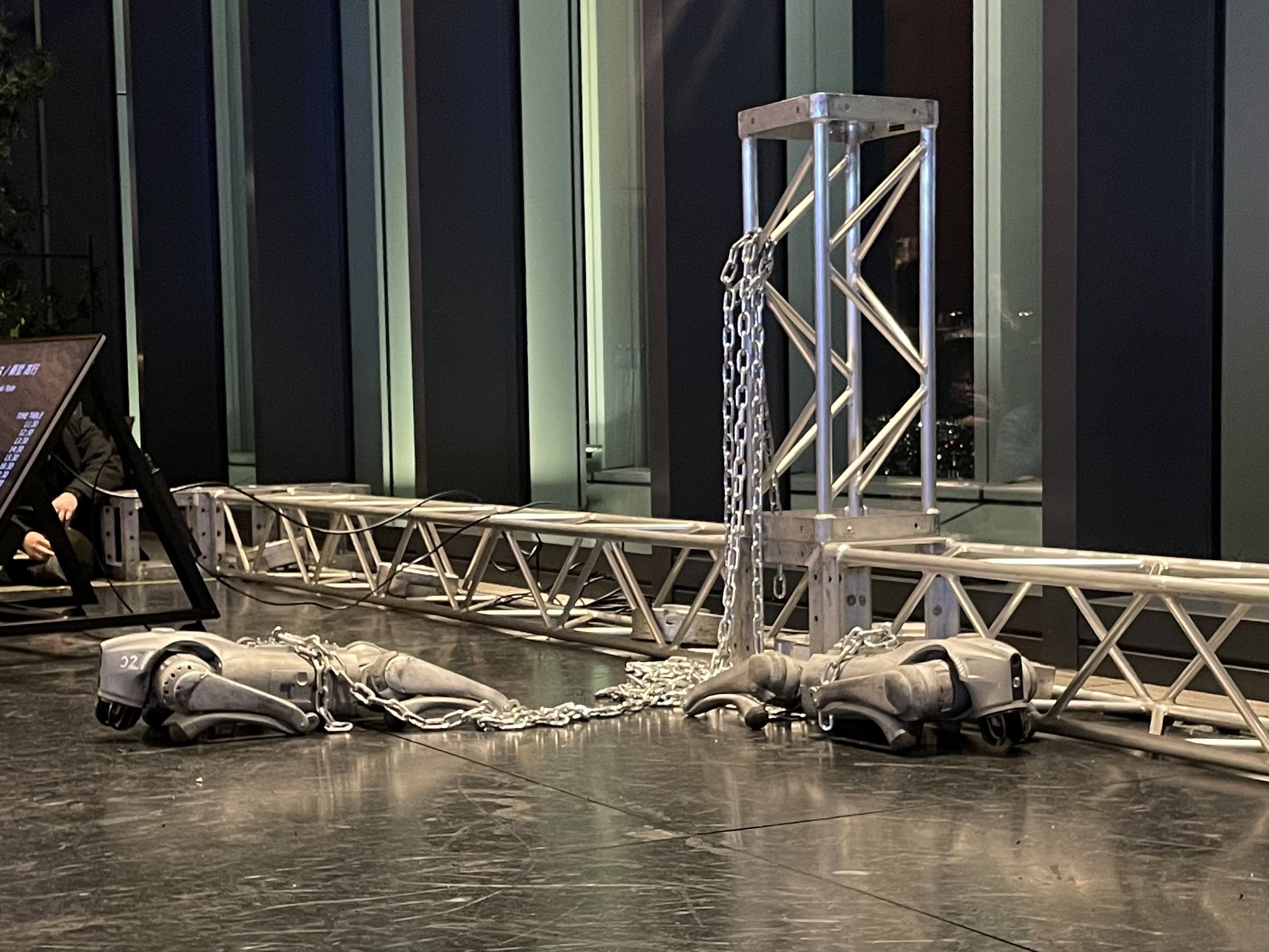 Chained robot dogs at an exhibition by artist Takayuki Todo in Tokyo.