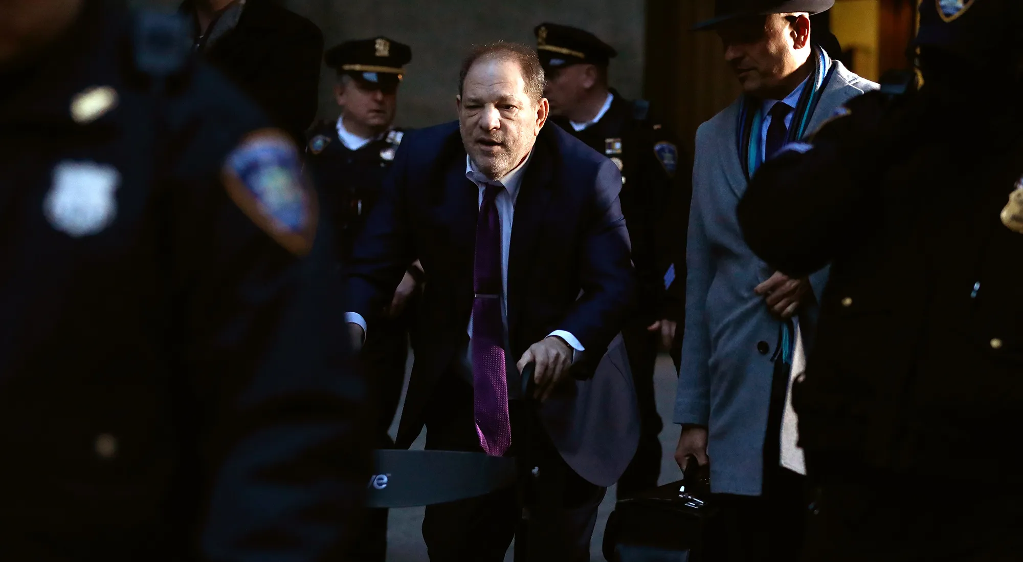 Harvey Weinstein departs from state supreme court in New York on Jan. 27.