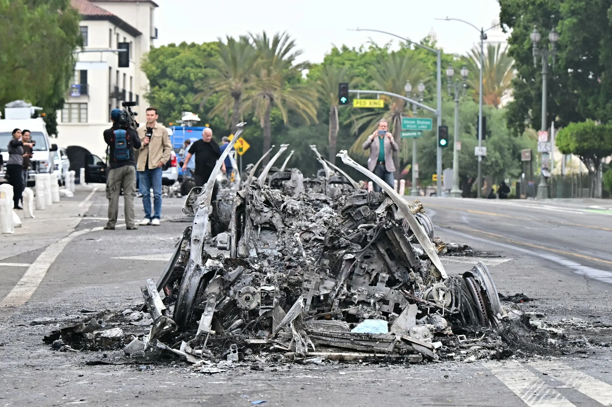 The remains of a burned Waymo vehicle following protests in Los Angeles on June 9.