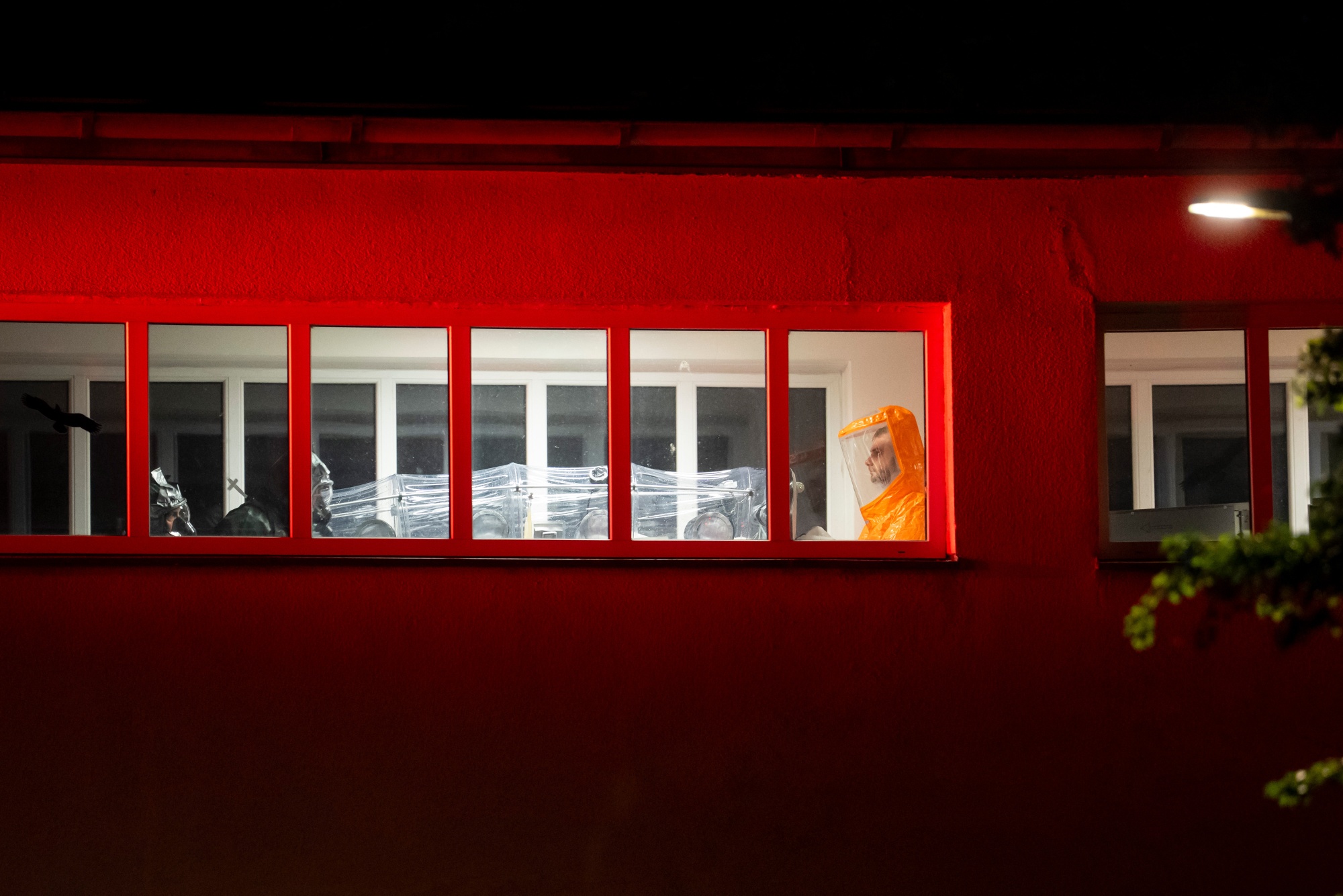 A US citizen, who was in contact with a person who contracted the Ebola virus, left, arrives at the Bulovka University Hospital in Prague, Czech Republic, on Thursday, May 21, 2026. Health authorities are contending with a rare strain of Ebola in central Africa that has no approved treatment or vaccine. Photographer: Milan Jaros/Bloomberg