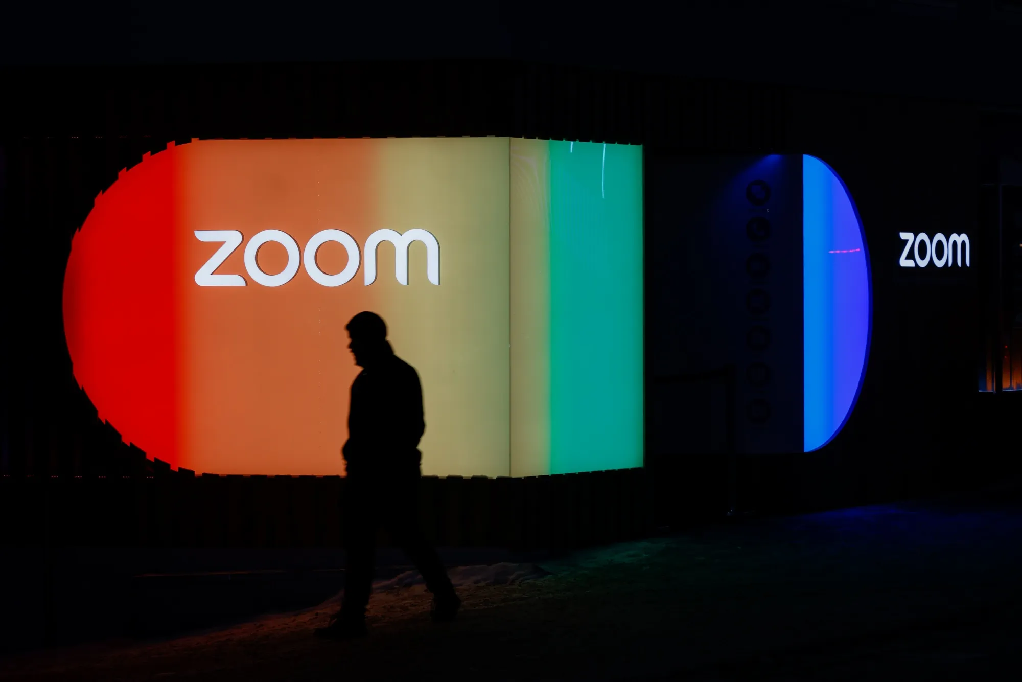 The Zoom Video Communications Inc. pavilion lit up in the colors of the pride flag at the World Economic Forum (WEF) in Davos, Switzerland, on Wednesday, Jan. 18, 2023.&nbsp;
