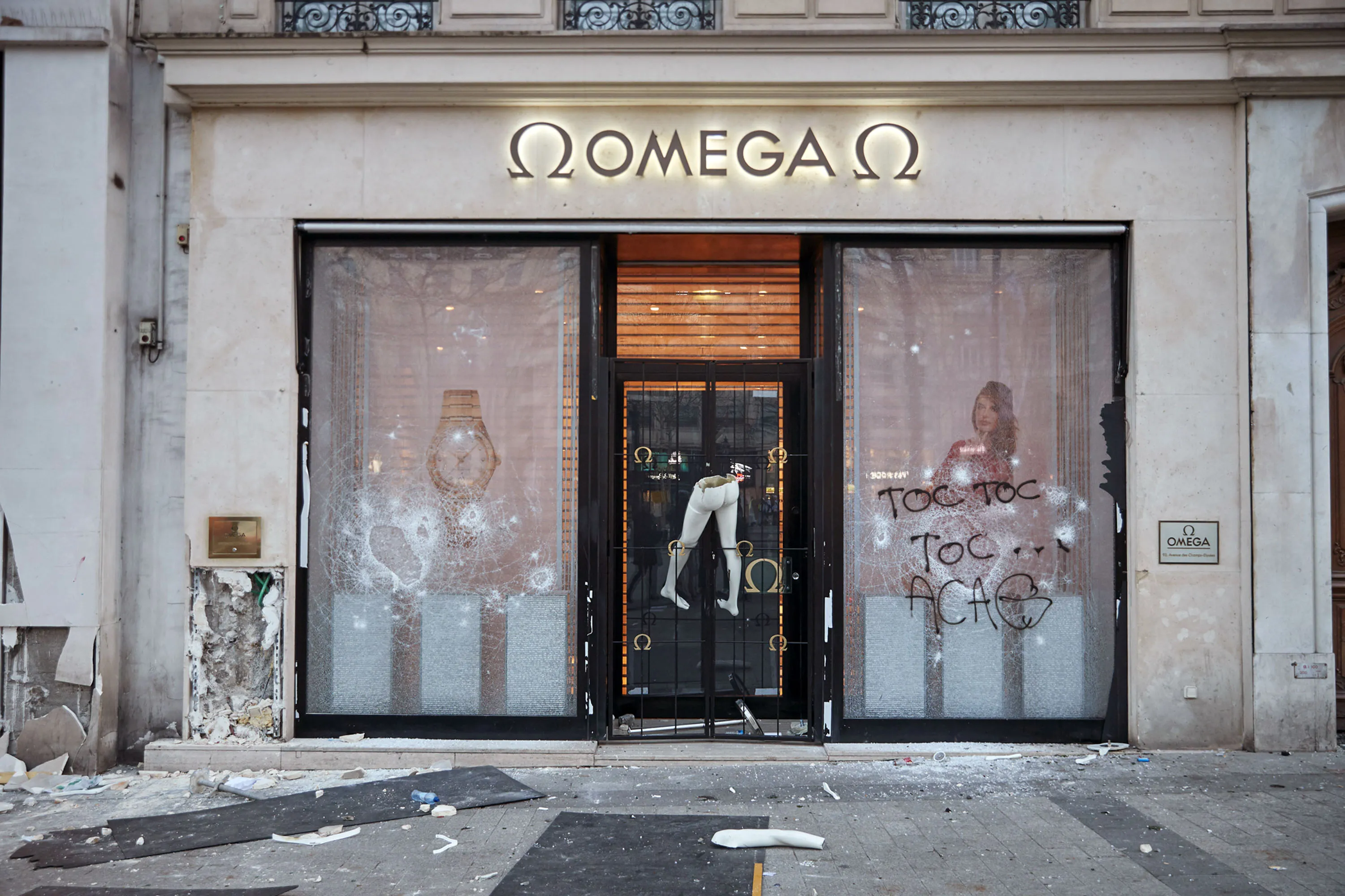 The vandalised Omega store on the Champs Elysees on March 16.