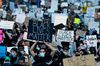 BOSTON, MASSACHUSETTS - MAY 31: Demonstrators protest in response to the recent death of George Floyd on May 31, 2020 in Boston, Massachusetts. Protests spread across cities in the U.S., and in other parts of the world in response to the death of African American George Floyd while in police custody in Minneapolis, Minnesota. (Photo by Maddie Meyer/Getty Images)