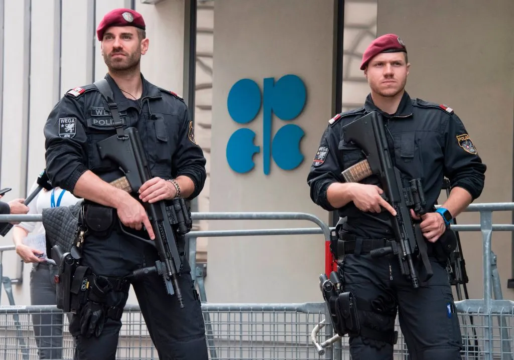 Austrian police officers guard the entrance to OPEC headquarters in Vienna, Austria in 2017.