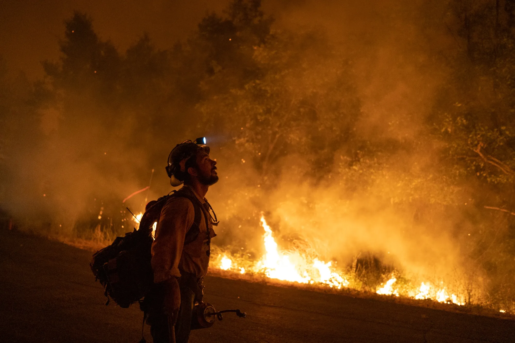 A firefighter monitors&nbsp;the Mosquito Fire near Foresthill, California on September&nbsp;7.