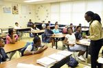 James Ford, a high school teacher in North Carolina, jokes with his class.