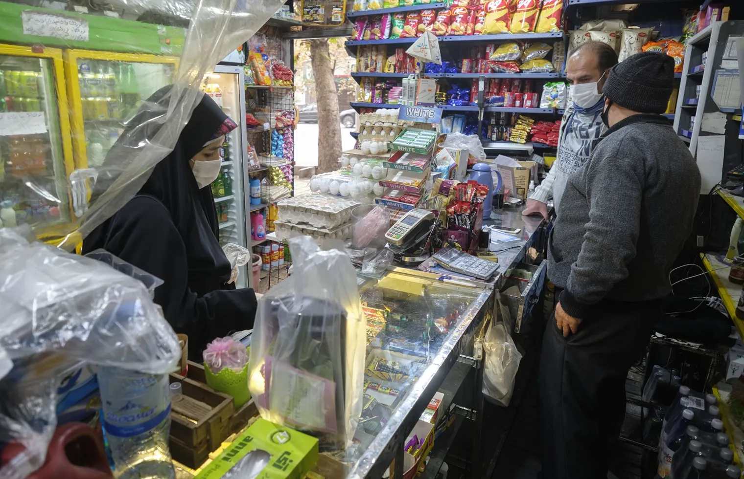 A woman shops at a market&nbsp;in northern Tehran.