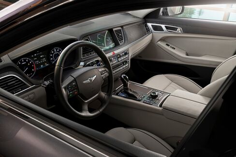 The Genesis interior is stately but not space-age.
