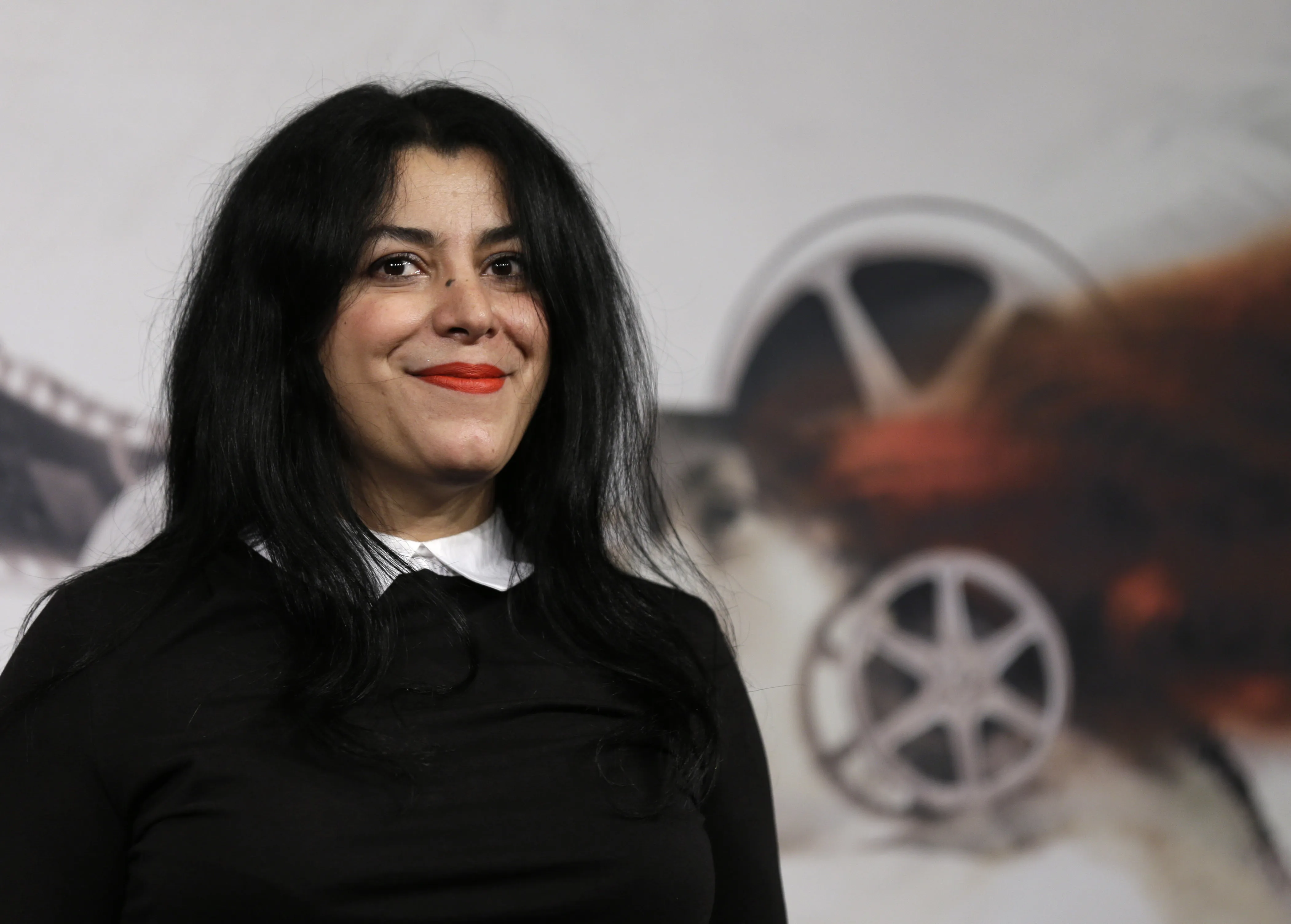 Director, illustrator and author Marjane Satrapi poses for photographers as she arrives to present the movie "La Bande des Jotas" at the 7th edition of the Rome International Film Festival in Rome, on Nov. 16, 2012. Marjane Satrapi, the acclaimed Iranian-French filmmaker and artist, has won the 2024 Princess of Asturias Foundation award for communication and humanities, the foundation announced Tuesday April 30, 2024. (AP Photo/Alessandra Tarantino, File)