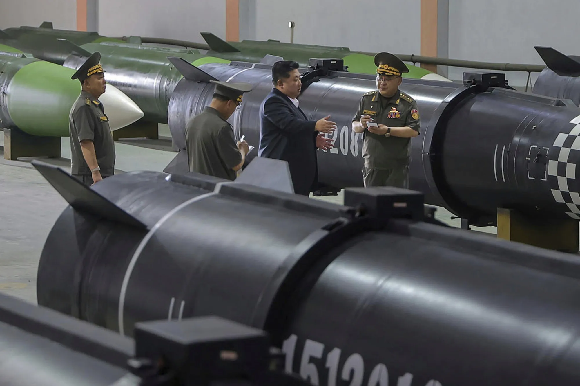 In this photo provided by the North Korean government, Kim Jong Un inspects a new weapons factory in North Korea, on Aug. 31.