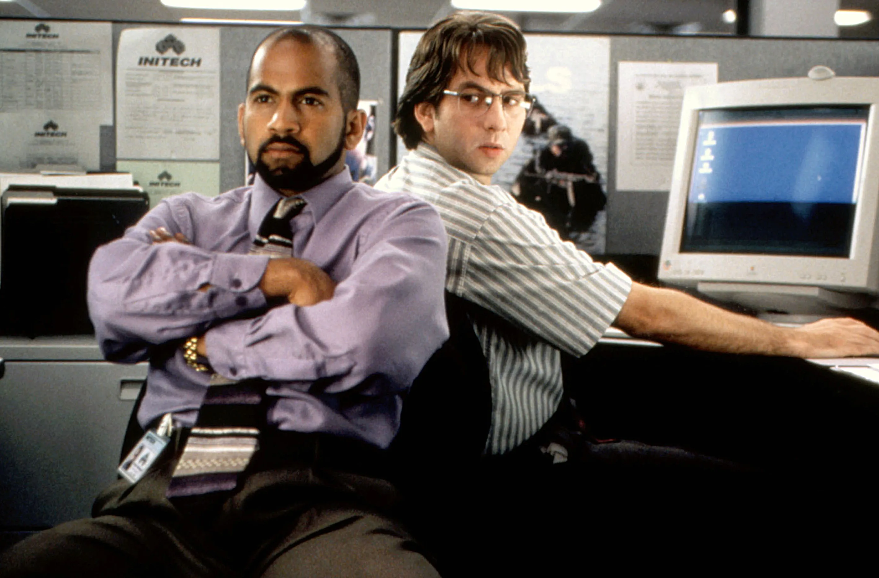 Ajay Naidu as Samir and David Herman as Michael in Office Space.
