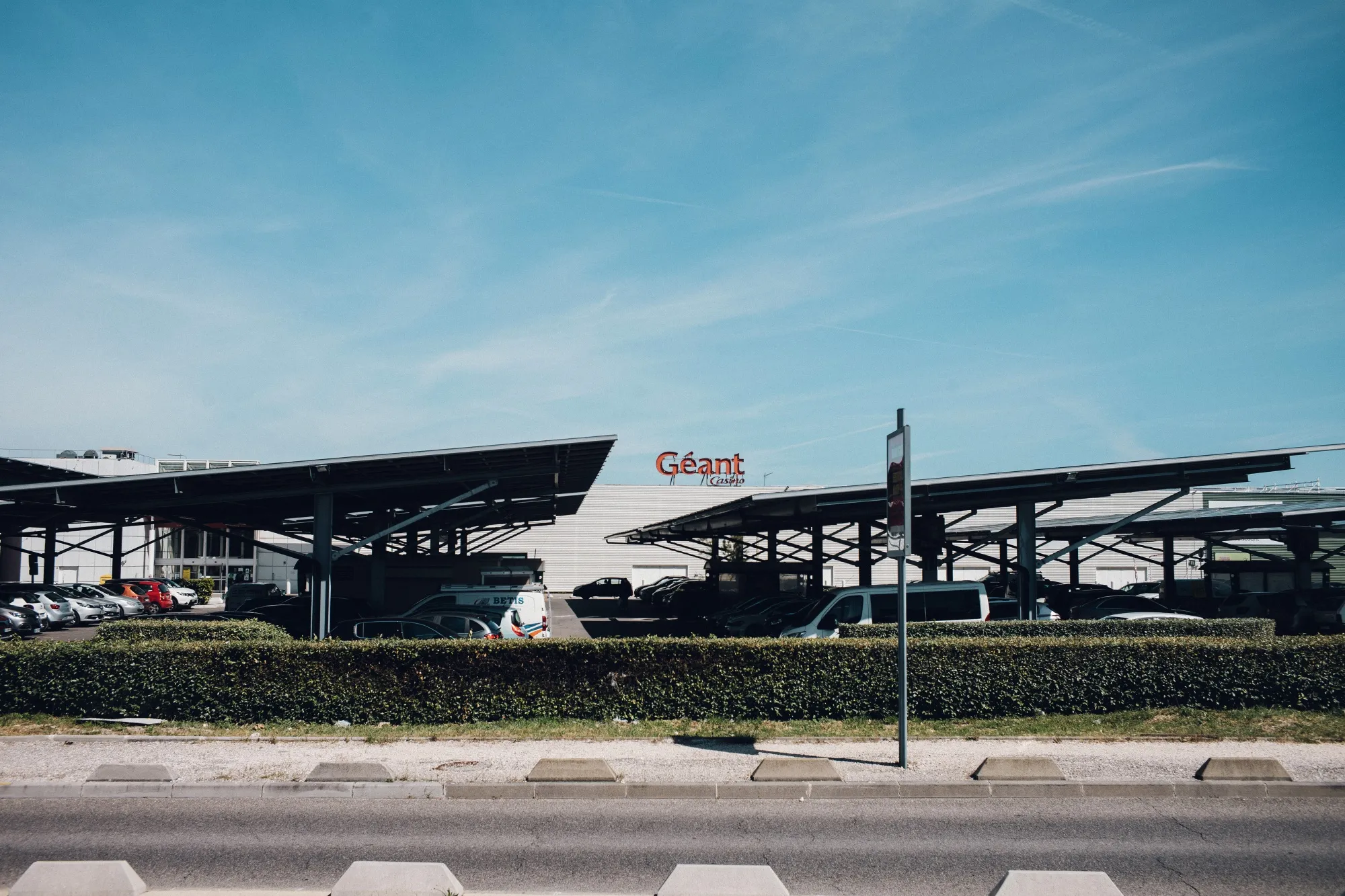 A GreenYellow renewable energy site in the parking lot of a Geant Casino hypermarket in Marseille, France.