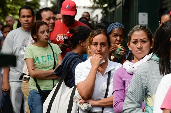 Queuing at the supermarket.
