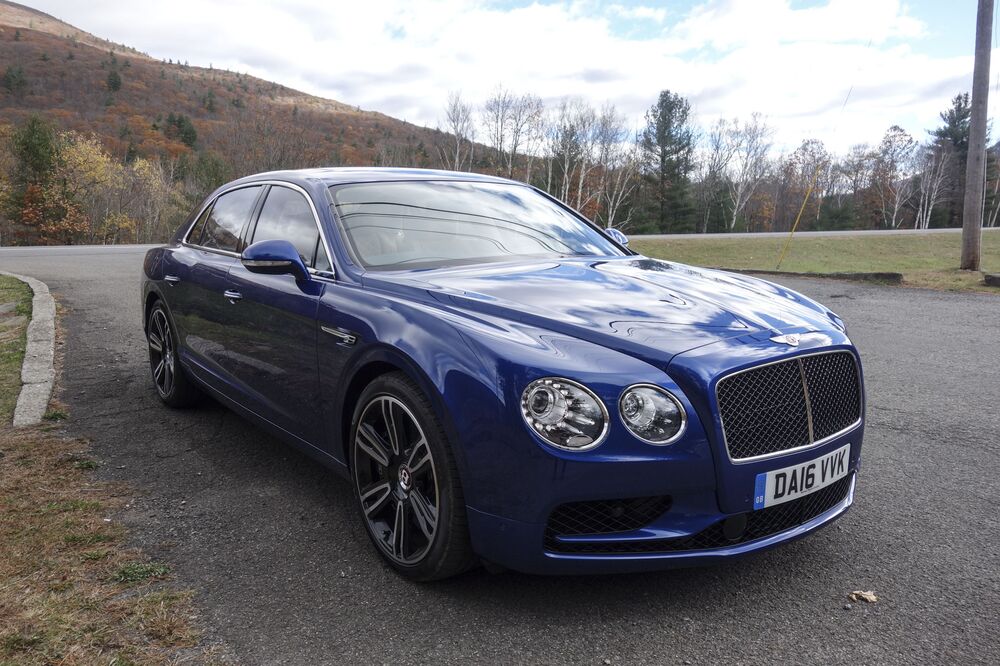Bentley Flying Spur Or Rolls Royce Ghost Which Fantasy Car Is For You Bloomberg