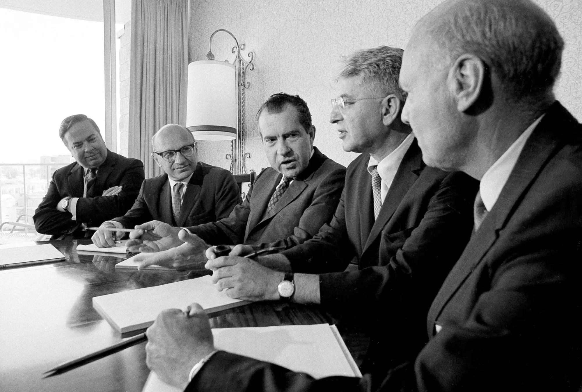 Richard Nixon with economic advisers Milton Friedman, at his immediate right, and&nbsp;Arthur Burns, left.